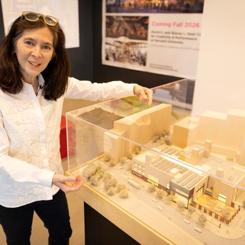 Diane Paulus poses with model of new ART coming in the fall of 2026.